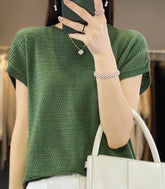 Blusa feminina em tricot texturizado sem costura, confortável e elegante, ideal para trabalho e lazer.